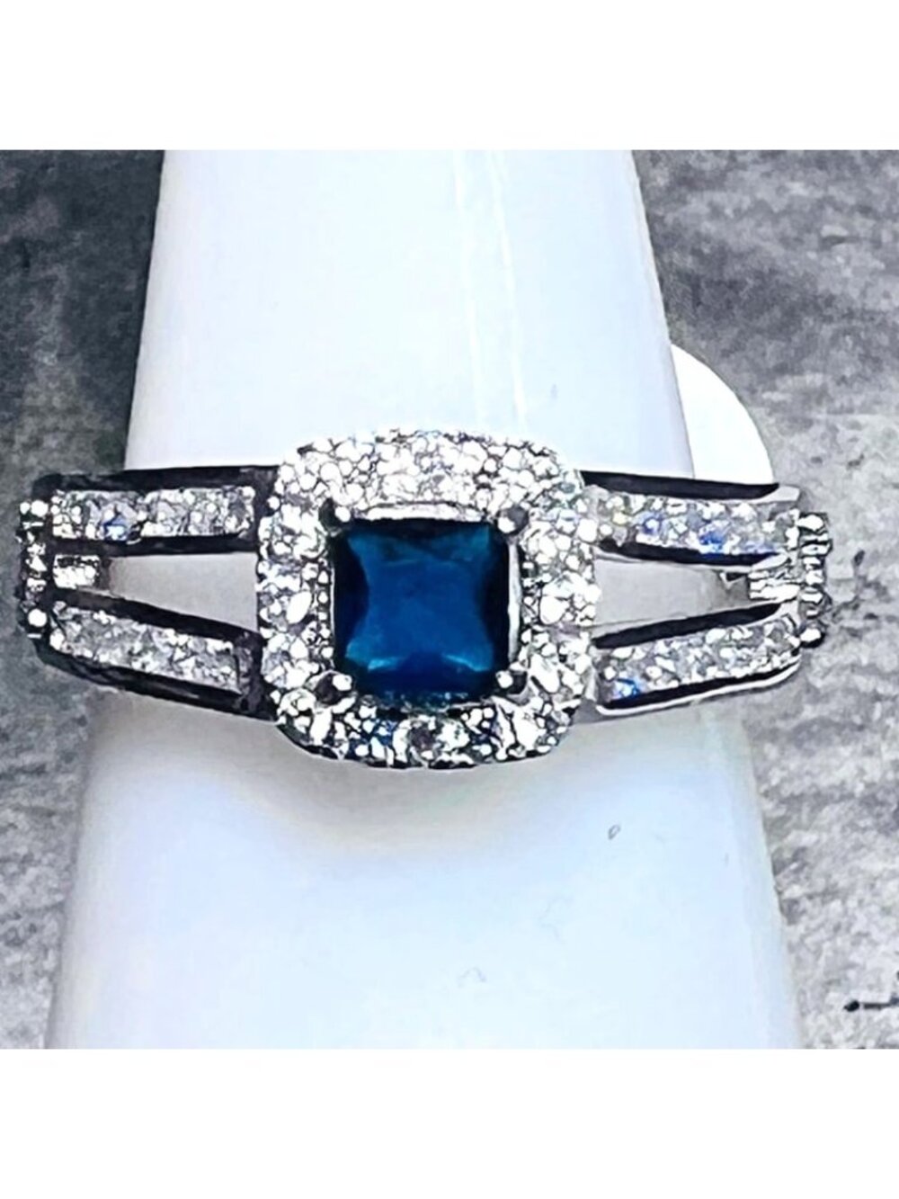 Ring Bomb Party Ring size 6  blue stone CZ type accents, silver color band